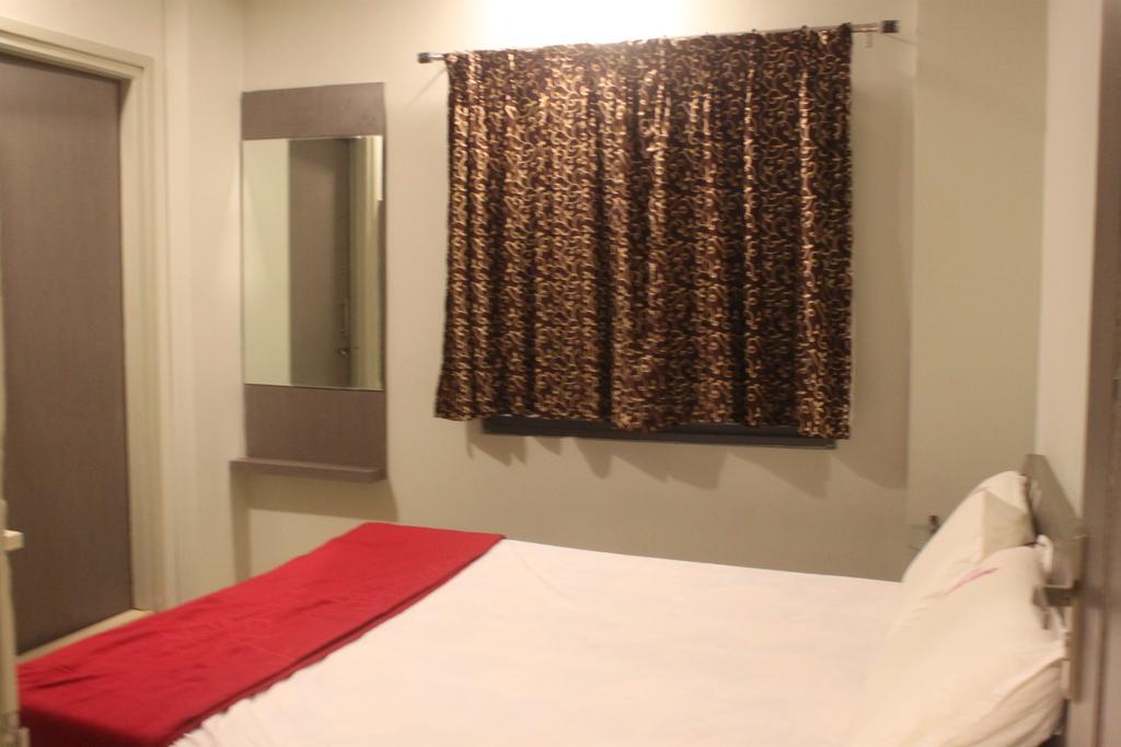 Hotel Lakshmi Grand Višákhapatnam Pokoj fotografie